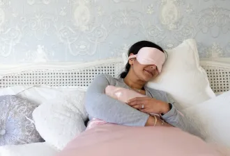 Woman sleeping wearing sleep mask Woman sleeping wearing sleep mask